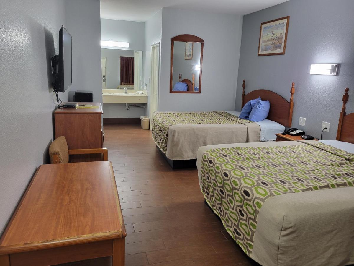 Scottish Inn & Suites Hankamer Extérieur photo