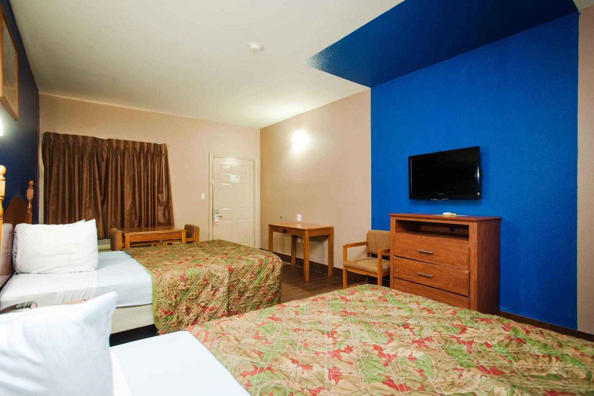 Scottish Inn & Suites Hankamer Chambre photo